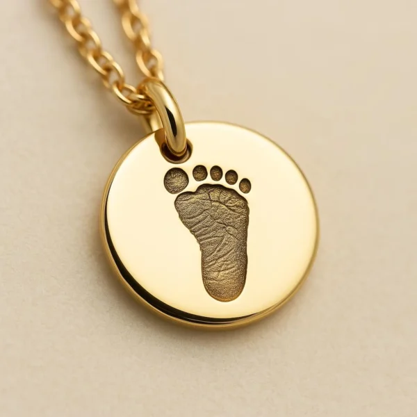 paw print gold disc necklace